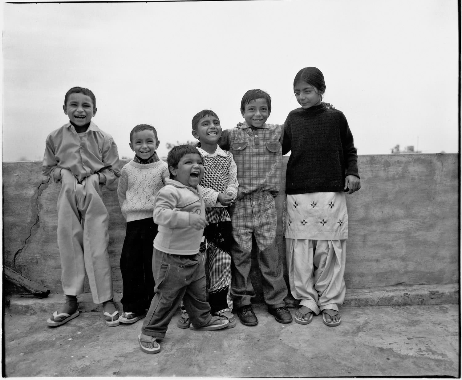 B&W Village childen laughing in Punjab