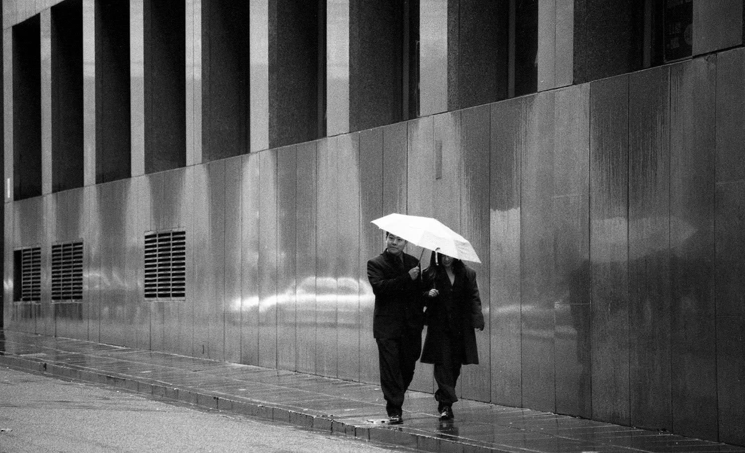 Walking in rain Melbourne city